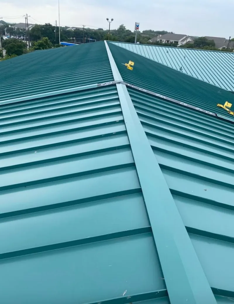 Green commercial metal roof ridge and valley for Metal Roof Repair in Newfane