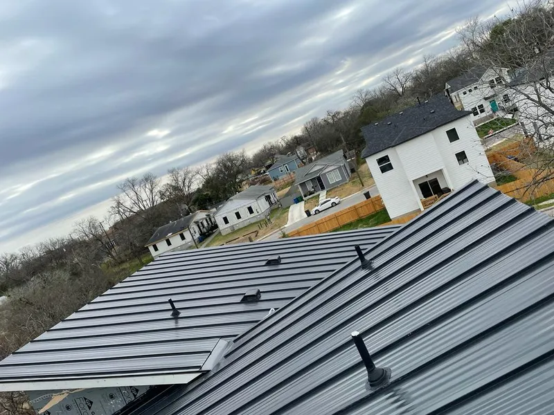 Standing seam metal roof panels with vents for Skylight Repair in Newfane
